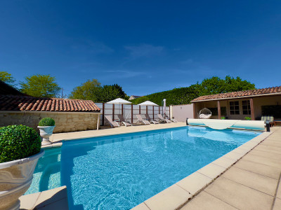 Stunning Manoir with five beautiful guest cottages and pool in the Loire Valley.