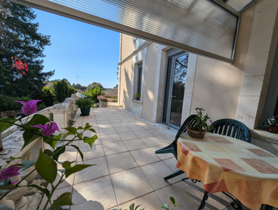 Charming Maison de Maître in the centre of Montendre, with large outbuildings, garden and rental income