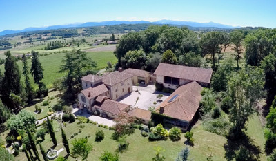 Stunning 6 bedroom chateau with outbuildings set in parkland in the Haute Garonne with views of the Pyrenees