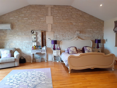 Stunning barn conversion finished to an exceptional standard with potential for gites or B&B. Swimming pool.