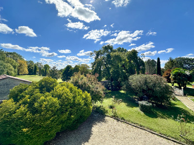 Magnificent Charentaise 5 bedroom house overlooking park gardens . Courtyard and barns . Not to be missed. 