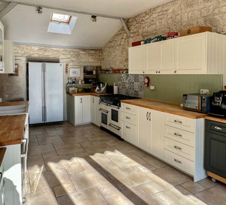 Up and running business opportunity - main house with 3 gîtes, pool and views, excellent quiet location. 