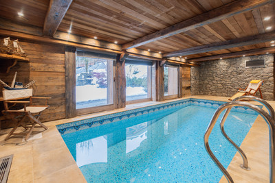 Luxury 3 bedroom chalet FOR SALE in Megeve , with an indoor pool in a private location close to the town. 