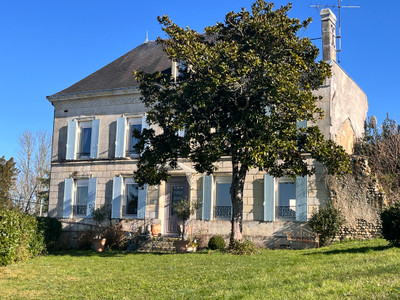 Stunning former Cognac house in 2.5 acres within walking distance to popular village and amenities. Rare find!