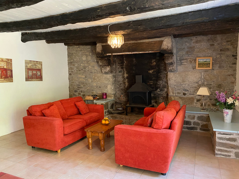 House in Duault Côtesd'Armor Stone cottage with lots of charm and character features Plus