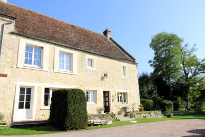 Charming Normandy stone farmhouse complex with rental potential less than 40 minutes from the seaside