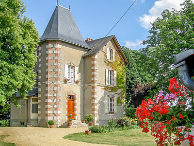 Five-bedroomed Manor-house, three luxurious gîtes + gypsy caravan providing excellent income; heated pool, mature grounds with glorious views over vines.