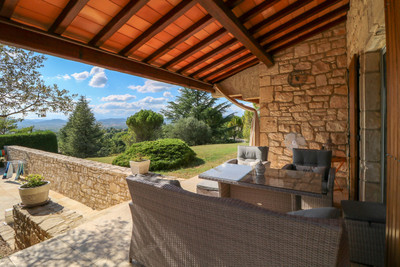 Stunning villa (240 m²) mainly on the ground floor on the hill with amazing views over the Cévennes national park, very spacious garage (8 cars), great garden (3800 m²) with olive trees and heated swimming pool, above medieval town Barjac.