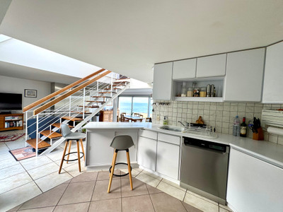 Stunning architect-designed home with panoramic sea views, terrace, large garden and private secure parking.