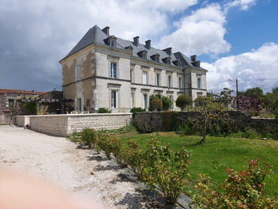 Wonderful, fully renovated Manoir, on edge of a small Pretty Village. 6 bedrooms, Pool, Tennis Court. Over 3 acres of garden. Cognac 20 mins. Angouleme 20 mins