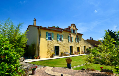Stunning countryside property with successful gites, beautiful gardens, pool and mountain views