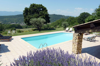Domain: 6 bed house (all ensuite) & 3 bed gite. Activity room, Pool, Stables, Chapel,14 Acres & Mountain Views