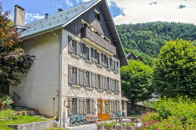 Magnificent Alpine Chateau 537m2 comprising 9 well-appointed individual apartments. The property also features a beautiful vaulted sitting room and spacious dining room with feature fireplace. The property sits on a private garden 6780m2 with garage and annexe and ample parking for 12 vehicles.   Located in the traditional Alpine village of Oz-en-Oisans in the Alpe d’Huez Grande Rousses ski area. 