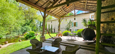 Stunningly renovated water mill with beautiful grounds, chateau views and a new swimming pool.  