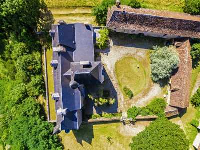 An unspoilt, authentic, medieval to renaissance castle with outbuildings above a river valley within 25 ha.