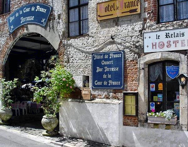 Magnificent former 16th century coaching inn - the inspiration for Hugo's 'Les Miserables' - in the heart of Montreuil sur Mer offering 12 bedrooms, two apartments and courtyard garden.