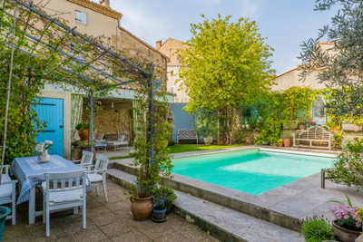 Elegant renovated 8-bed maison de maître with delightful garden and pool in a super, lively Minervois village.