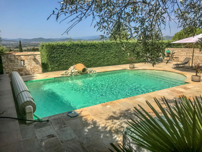 Stunning villa (240 m²) mainly on the ground floor on the hill with amazing views over the Cévennes national park, very spacious garage (8 cars), great garden (3800 m²) with olive trees and heated swimming pool, above medieval town Barjac.