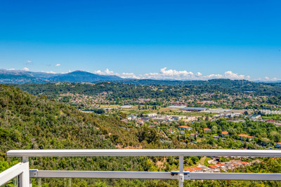 A stunning contemporary villa with panoramic sea views, perched on the hills of Mandelieu