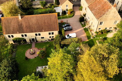 Charming Normandy stone farmhouse complex with rental potential less than 40 minutes from the seaside