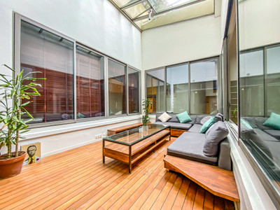 Magnificent Montmartre loft with a large patio at the center and access to a swimming pool.
