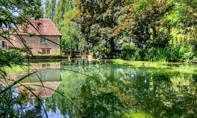 Stunning 18th Century former flax mill complex with gites in an idyllic setting. Great business opportunity. 