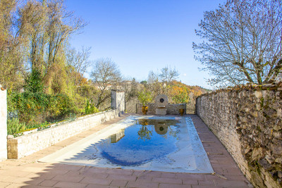 Stunning 14th century townhouse in a beautiful white stone village with terraces and swimming pool