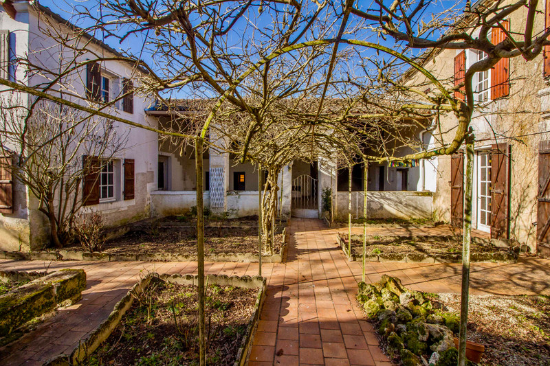 House for sale in Vars Charente Stone house with large courtyard
