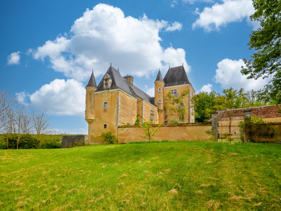 An unspoilt, authentic, medieval to renaissance castle with outbuildings above a river valley within 25 ha.