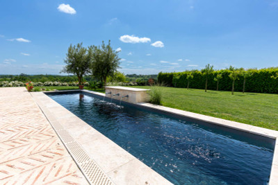 Luxurious and spacious furnished (16th Century) Chateau Wing with landscaped gardens, views and swimming pool.