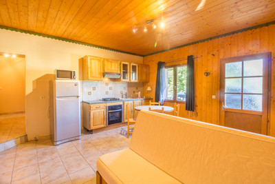 Beautiful chalet for sale in the Three Valleys, featuring an apartment and land