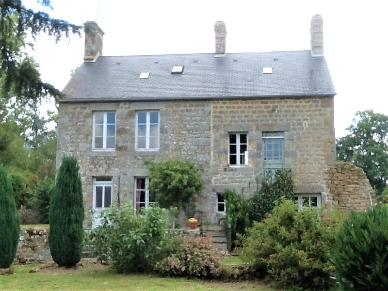 House for sale in NotreDameduRocher Orne Lovely stone house with plenty of character in a