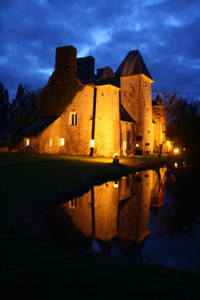 Fortified 15th-c château in the heart of Normandy. Moat, 27 acres, B&B business, 9 bedrooms & outbuildings