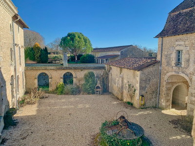 **UNDER OFFER** Château built in the 14th and 18th centuries with outbuildings around a large swimming pool. 