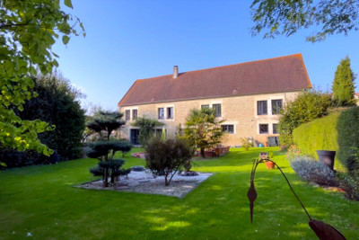 Charming Normandy stone farmhouse complex with rental potential less than 40 minutes from the seaside